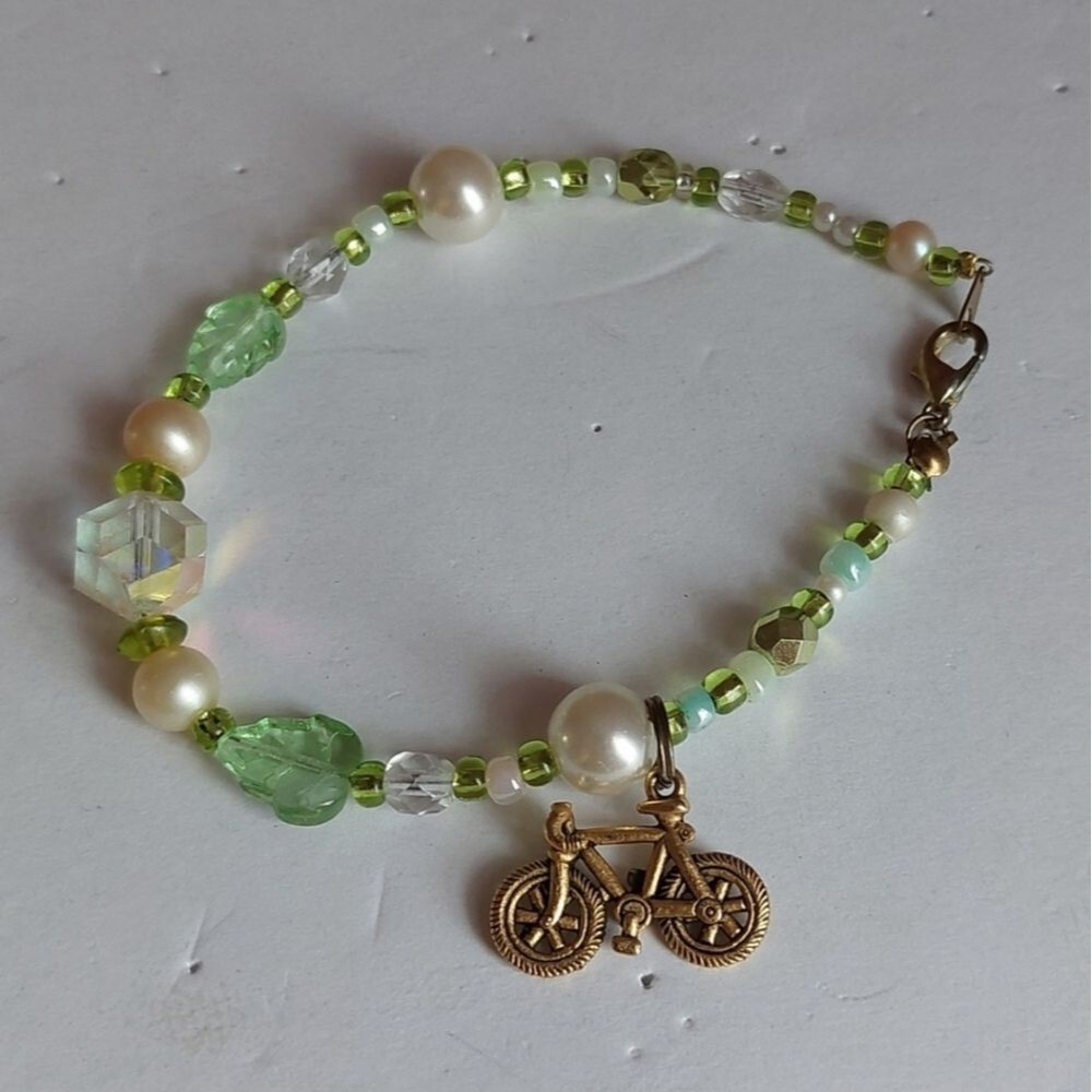 Gold Tone Bicycle Charm Green Beed Bracelet